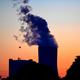 Smoke pours out of the cooling tower of a coal-fired power plant in western Germany, on May 30, 2020.